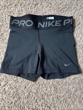women's black nike pros size 0